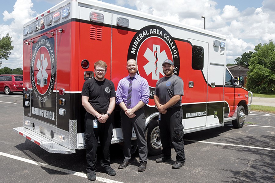 EMS student Austin Shinabargar, Lead EMS Instructor Darick Day, and EMS student Joseph Wingbermuehle