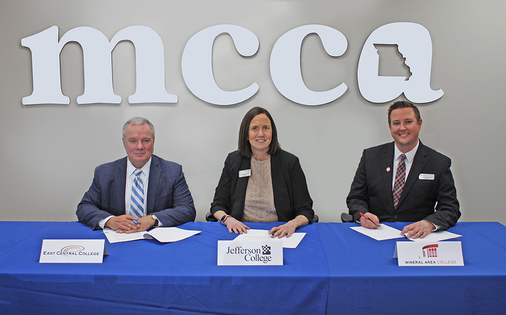 Photo of Dr. Gilgour with Jefferson College and East Central College at the MCCA signing. 