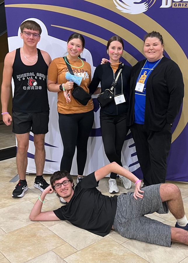 Members before the Scholar Glow Dash 5K fundraiser,  (Pictured L to R)  Robert "Ethan" McMahan, Carly Saunders, Riley Dunn, and Thia Butler; Front Row, Drake Weibrecht